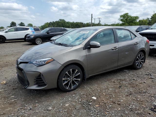TOYOTA COROLLA L 2019 with VIN 2T1BURHEXKC128515 - Photo from auction