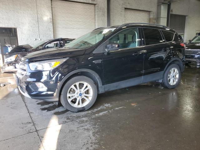 FORD ESCAPE SE 2018 with VIN 1FMCU9GD0JUD51107 - Photo from auction