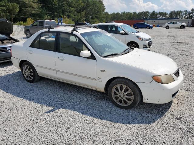 Photo 4 from auction – 2002 MAZDA PROTEGE DX with VIN JM1BJ225X21597889
