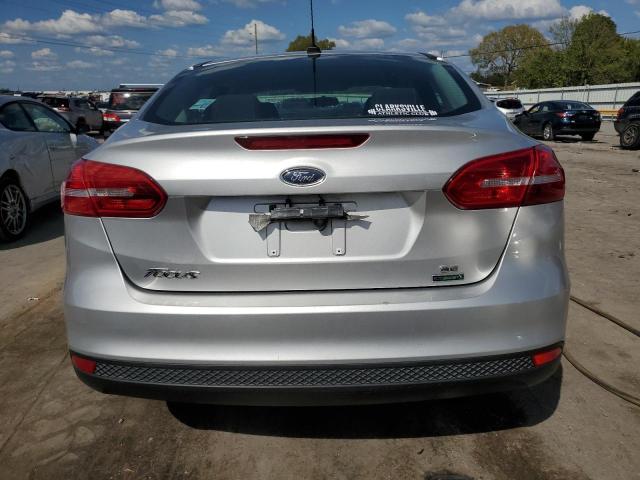 Foto 6 de la subasta – 2018 FORD FOCUS SE con VIN 1FADP3FEXJL249011