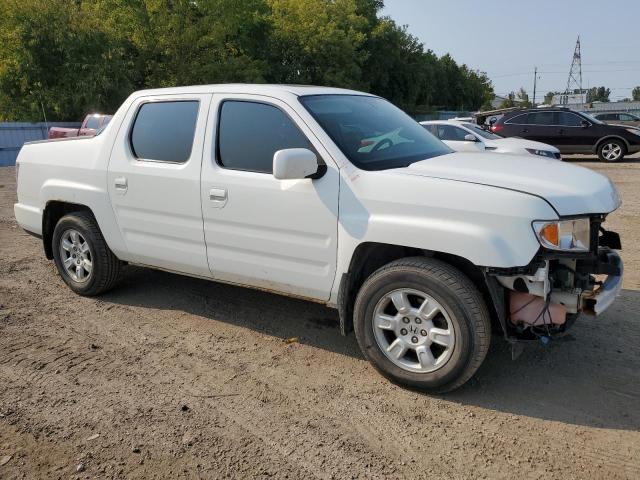 Photo 4 from auction – 2014 HONDA RIDGELINE with VIN 5FPYK1F57EB502851