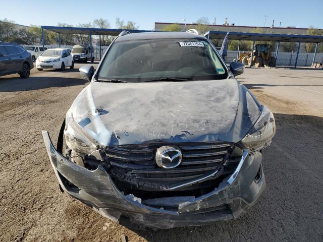 Photo 5 from auction – 2016 MAZDA CX-5 GT with VIN JM3KE2DY3G0603130