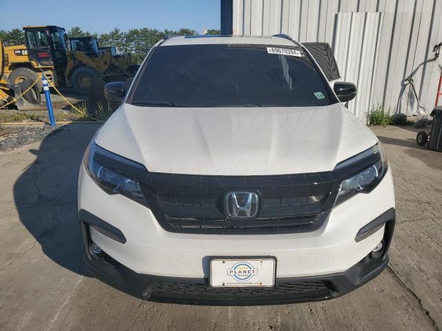Photo 5 from auction – 2022 HONDA PILOT TRAI with VIN 5FNYF6H81NB022239