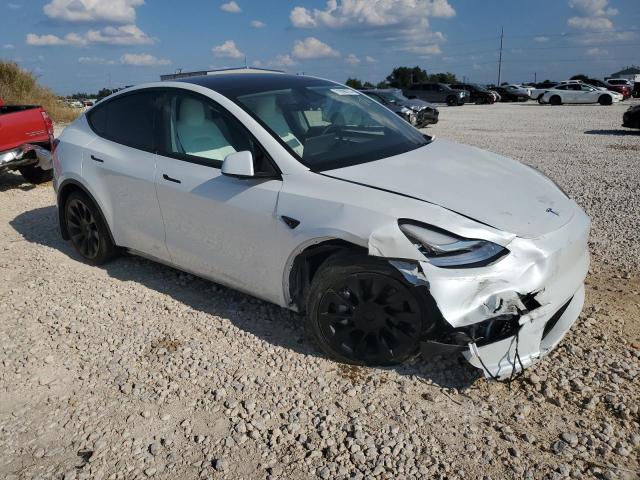 Photo 4 from auction – 2023 TESLA MODEL Y with VIN 7SAYGDEE1PA147630