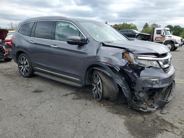 Photo 4 from auction – 2021 HONDA PILOT TOUR with VIN 5FNYF6H91MB094890