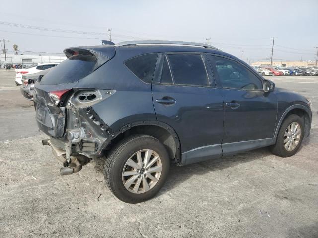 Photo 3 from auction – 2013 MAZDA CX-5 SPORT with VIN JM3KE2BE6D0147497