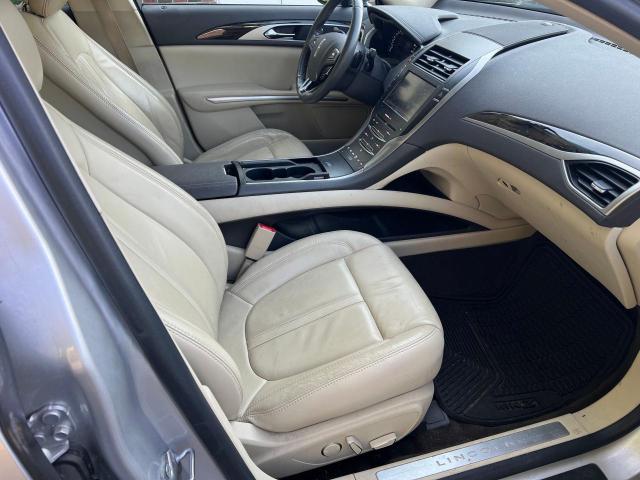 Photo 5 from auction – 2014 LINCOLN MKZ with VIN 3LN6L2J93ER823860