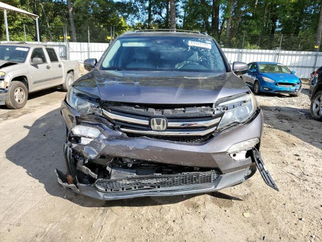 Photo 5 from auction – 2017 HONDA PILOT ELIT with VIN 5FNYF6H02HB100848