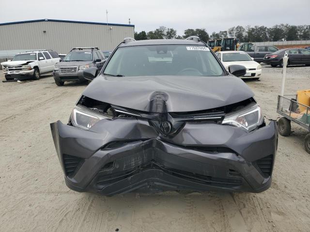 Photo 5 from auction – 2017 TOYOTA RAV4 LE with VIN JTMZFREV8HJ121489