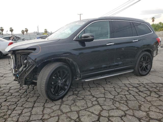 HONDA PILOT TOUR 2016 with VIN 5FNYF6H99GB101816 - Photo from auction