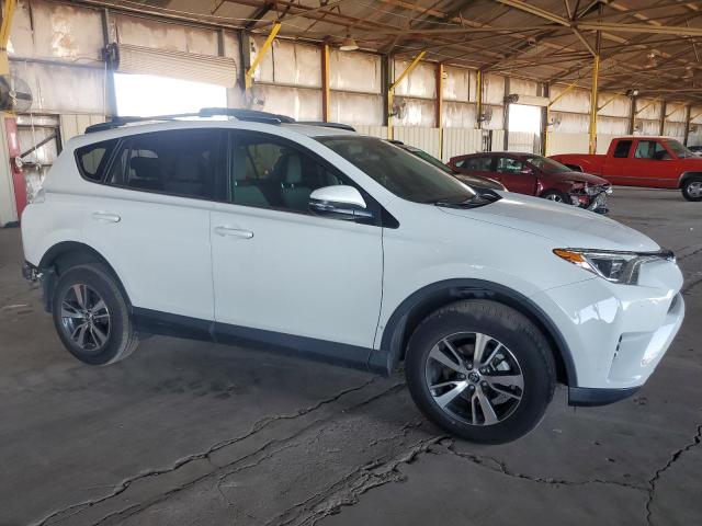 Photo 4 from auction – 2017 TOYOTA RAV4 XLE with VIN JTMRFREV4HJ171807