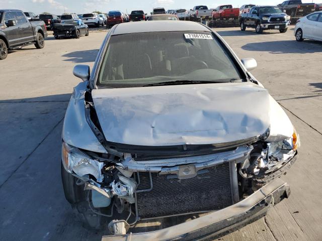 Photo 5 from auction – 2011 HONDA CIVIC LX with VIN 19XFA1F55BE041878