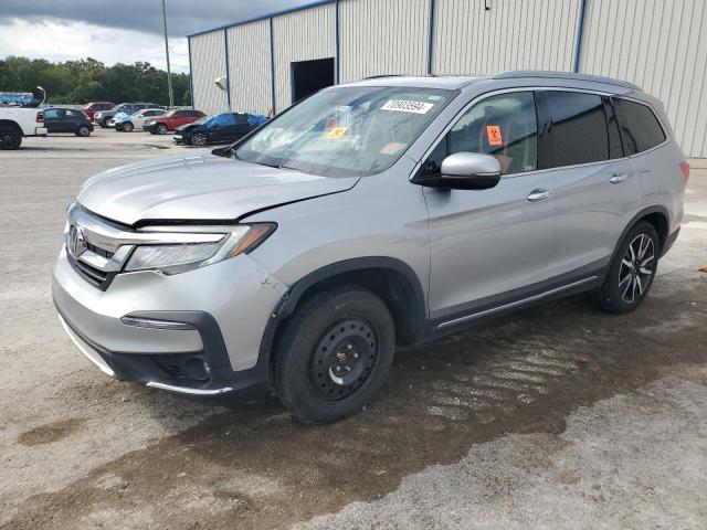 Photo 1 from auction – 2021 HONDA PILOT TOUR with VIN 5FNYF5H92MB033378