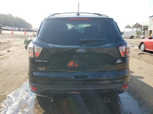 Photo 6 from auction – 2018 FORD ESCAPE SE with VIN 1FMCU9GD1JUA27454