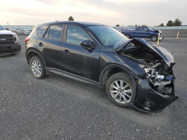 Photo 4 from auction – 2015 MAZDA CX-5 TOURI with VIN JM3KE4CY0F0453425