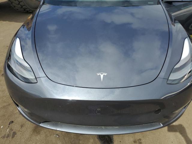 Photo 11 from auction – 2023 TESLA MODEL Y with VIN 7SAYGDED3PF931575