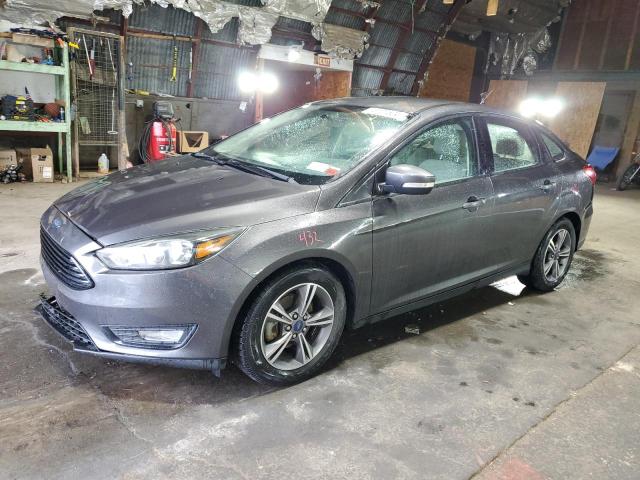 FORD FOCUS SE 2018 with VIN 1FADP3FEXJL237585 - Photo from auction
