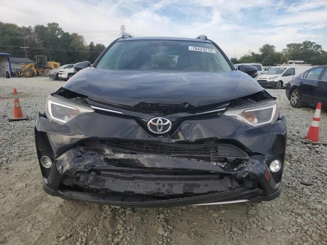 Photo 5 from auction – 2016 TOYOTA RAV4 XLE with VIN 2T3WFREV7GW269264