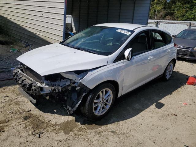 FORD FOCUS SE 2015 with VIN 1FADP3K21FL202405 - Photo from auction