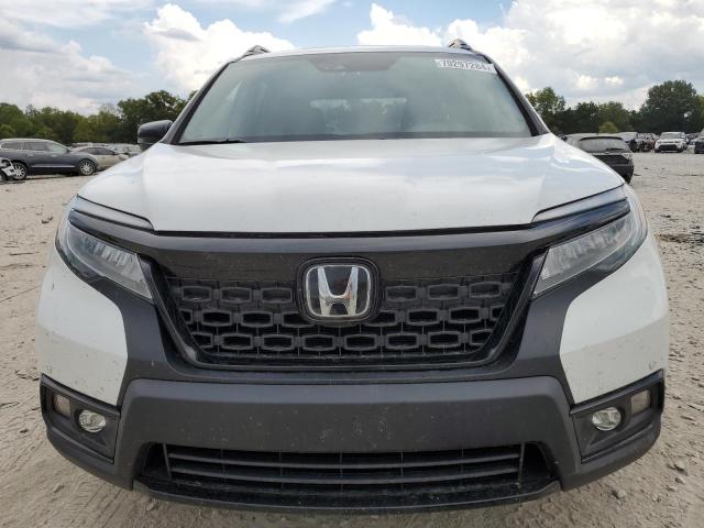 Photo 5 from auction – 2021 HONDA PASSPORT E with VIN 5FNYF8H03MB014714