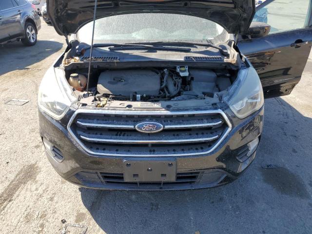 Photo 12 from auction – 2018 FORD ESCAPE SE with VIN 1FMCU0GD6JUA31267