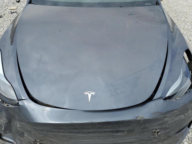 Photo 11 from auction – 2023 TESLA MODEL Y with VIN 7SAYGDEF4PF829543