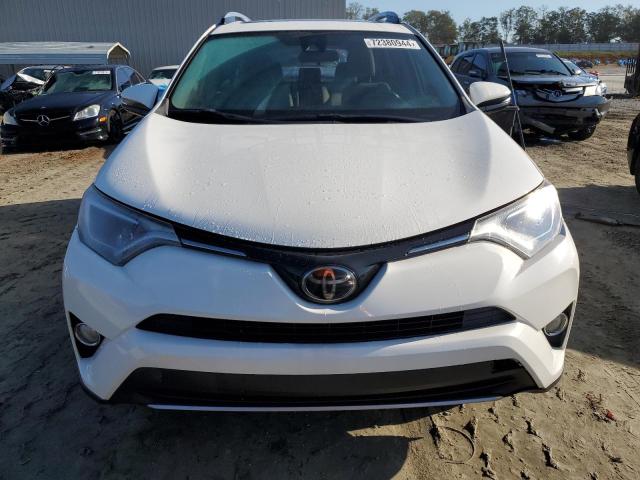 Photo 5 from auction – 2017 TOYOTA RAV4 XLE with VIN JTMRFREV0HJ704655