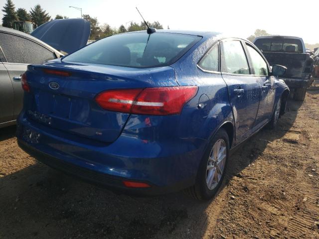 Photo 3 from auction – 2018 FORD FOCUS SE with VIN 1FADP3F21JL310798
