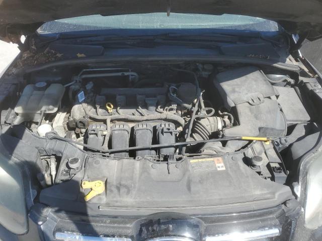 Photo 11 from auction – 2012 FORD FOCUS TITA with VIN 1FADP3N2XDL263356