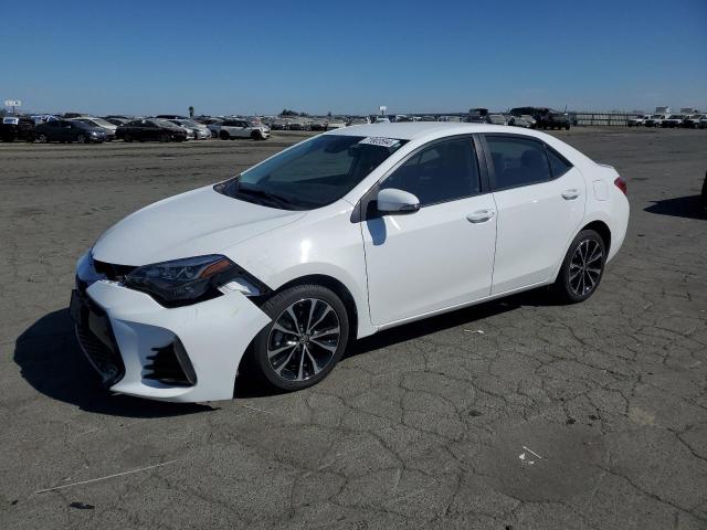 TOYOTA COROLLA L 2017 with VIN 5YFBURHE8HP717555 - Photo from auction
