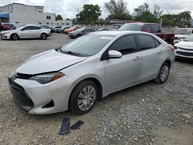 TOYOTA COROLLA L 2018 with VIN 5YFBURHE9JP815399 - Photo from auction