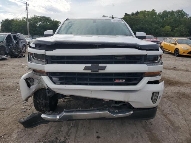 Photo 5 from auction – 2018 CHEVROLET SILVERADO with VIN 3GCUKREC0JG485756