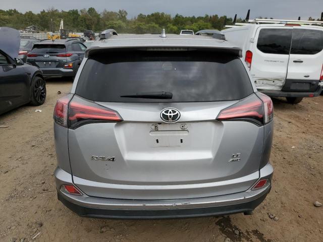 Photo 6 from auction – 2018 TOYOTA RAV4 LE with VIN 2T3BFREVXJW727062