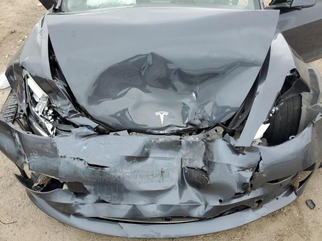 Photo 11 from auction – 2018 TESLA MODEL 3 with VIN 5YJ3E1EA7JF077487