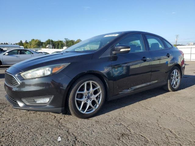 FORD FOCUS SE 2015 with VIN 1FADP3F20FL291510 - Photo from auction
