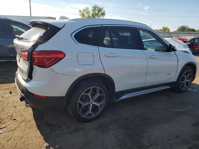 Photo 3 from auction – 2018 BMW X1 XDRIVE2 with VIN WBXHT3C32J5K32267
