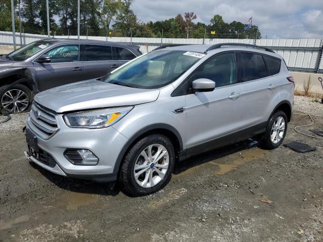 FORD ESCAPE SE 2018 with VIN 1FMCU0GDXJUD06350 - Photo from auction