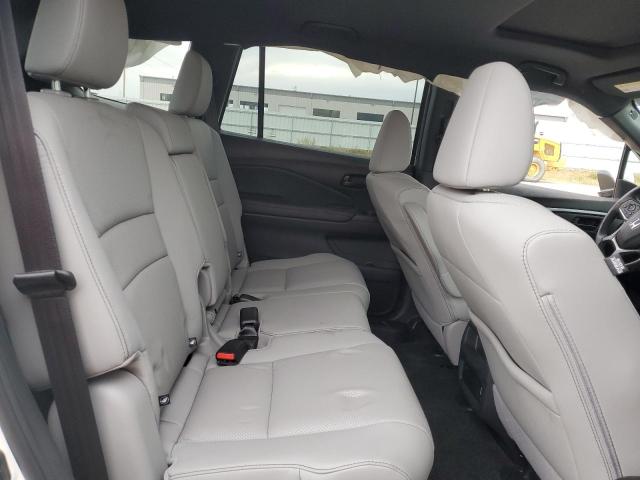 Photo 11 from auction – 2023 HONDA PASSPORT E with VIN 5FNYF8H58PB044081