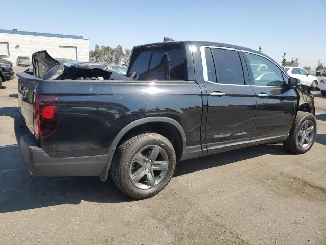 Photo 3 from auction – 2023 HONDA RIDGELINE with VIN 5FPYK3F76PB033977