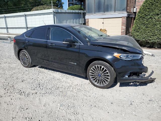 Photo 4 from auction – 2018 FORD FUSION TIT with VIN 3FA6P0RU2JR247961