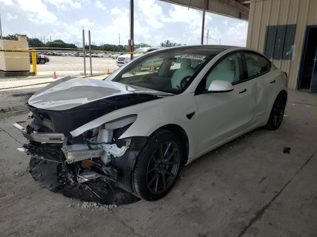 TESLA MODEL 3 2022 with VIN 5YJ3E1EAXNF321803 - Photo from auction