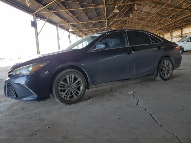 TOYOTA CAMRY LE 2017 with VIN 4T1BF1FK7HU764093 - Photo from auction