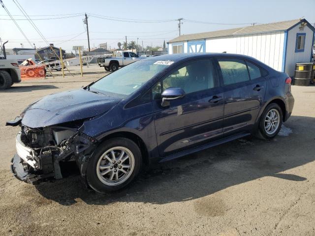 TOYOTA COROLLA LE 2022 with VIN JTDEAMDE5NJ060017 - Photo from auction