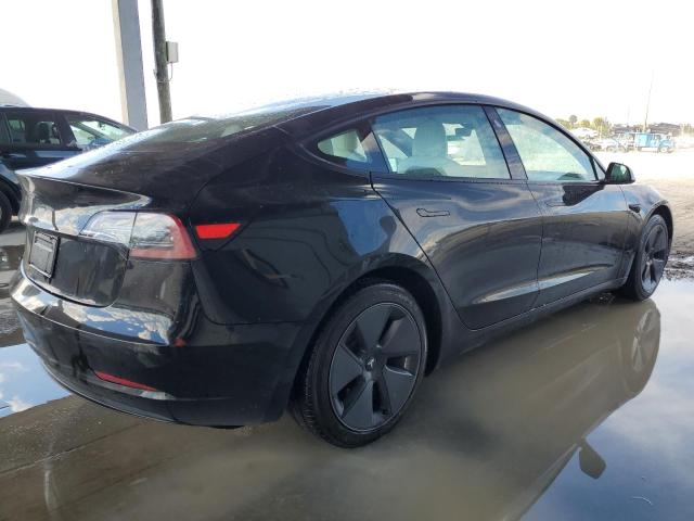 Photo 3 from auction – 2021 TESLA MODEL 3 with VIN 5YJ3E1EA1MF963602