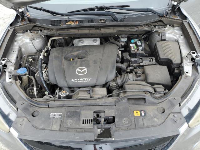 Photo 11 from auction – 2015 MAZDA CX-5 SPORT with VIN JM3KE2BE7F0446404