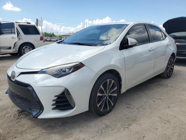 TOYOTA COROLLA L 2018 with VIN 5YFBURHE6JP787741 - Photo from auction