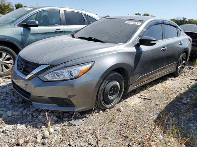 NISSAN ALTIMA 2.5 2016 with VIN 1N4AL3AP0GC286469 - Photo from auction