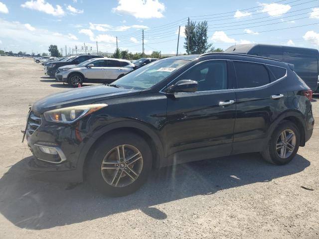 HYUNDAI SANTA FE S 2018 with VIN 5NMZU3LB0JH070450 - Photo from auction