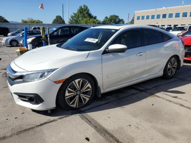 HONDA CIVIC EXL 2018 with VIN JHMFC1F73JX002831 - Photo from auction
