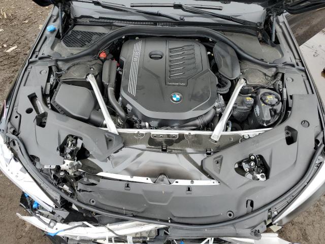 Photo 11 from auction – 2022 BMW 840XI with VIN WBAGV4C09NCK23692